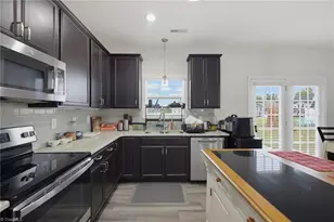 668 Palomino Mustang Dr, Whitsett, NC 27377 - Photo 10