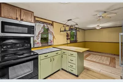 7965 Troxler Mill Road, Gibsonville, NC 27249 - Photo 12