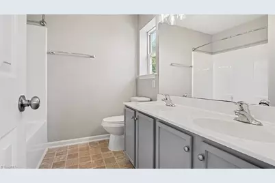 1133 Oak Blossom Way, Whitsett, NC 27377 - Photo 18