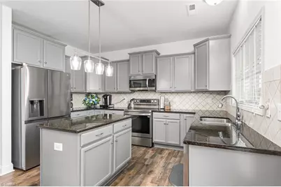 750 Cannonade Drive, Whitsett, NC 27377 - Photo 18