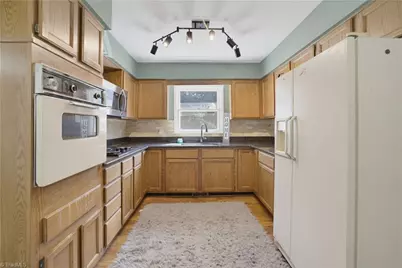 8009 Tam Oshanter Drive, Greensboro, NC 27409 - Photo 10