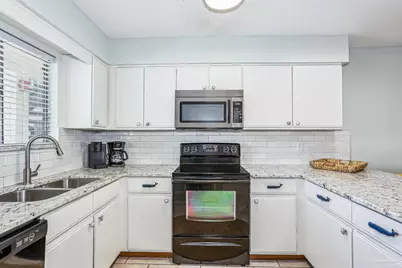 7453 Sunset Harbor Dr #2-203, Navarre Beach, FL 32566 - Photo 14
