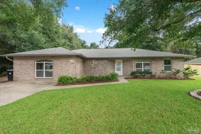 7448 Rustling Pines Dr, Milton, FL 32583 - Photo 1