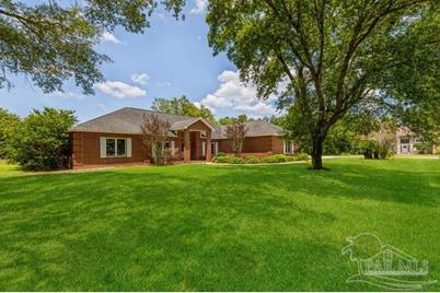 2847 Pebble Beach Dr, Navarre, FL 32566 - Photo 1