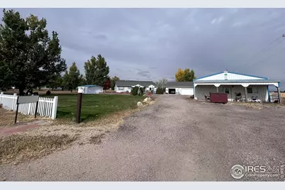 717 E 3rd Ave, Wiggins, CO 80654 - Photo 1