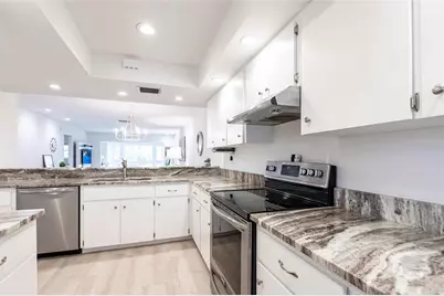 7151 Wood Creek Drive #205, Sarasota, FL 34231 - Photo 8