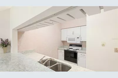 7044 Woodside Oaks Circle #9, Sarasota, FL 34231 - Photo 10