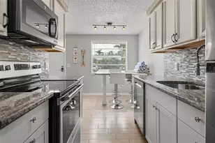 208 Peacock Ln, Holmes Beach, FL 34217 - Photo 10