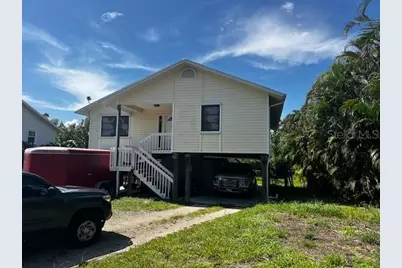 5564 Birdsong Lane, Bokeelia, FL 33922 - Photo 1