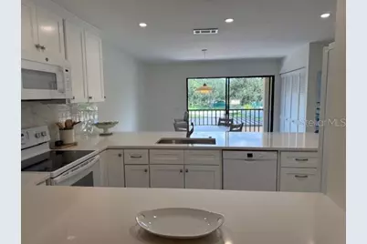 6120 Country Club Way #207, Sarasota, FL 34243 - Photo 2