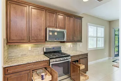 7546 Divot Loop, Lakewood Ranch, FL 34202 - Photo 24