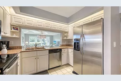 7320 Golf Pointe Circle, Sarasota, FL 34243 - Photo 28