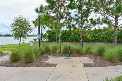 8023 Sandstar Way, Sarasota, FL 34240 - Photo 32