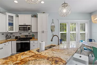 6908 Holmes Boulevard, Holmes Beach, FL 34217 - Photo 14