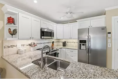 3908 Oakhurst Boulevard #3185, Sarasota, FL 34233 - Photo 6