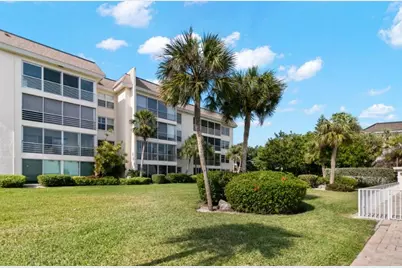 605 Sutton Place #102, Longboat Key, FL 34228 - Photo 1