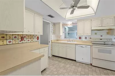 3206 Village Green Drive #1036, Sarasota, FL 34239 - Photo 6