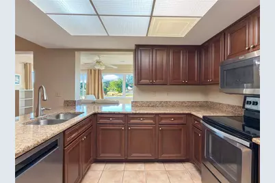 1232 Haddington Circle #65, Sun City Center, FL 33573 - Photo 14