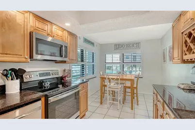 1001 Benjamin Franklin Drive #110, Sarasota, FL 34236 - Photo 18