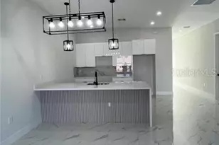 1009/1011 NE 15th Ln, Cape Coral, FL 33909 - Photo 12