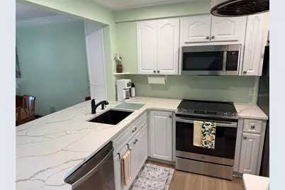 18304 Gulf Boulevard #105, Redington Shores, FL 33708 - Photo 2