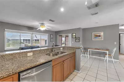 702 Huxley Place, Sun City Center, FL 33573 - Photo 6