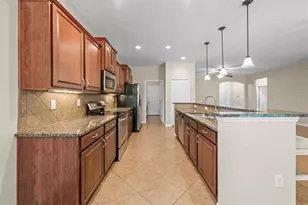 8302 Karpeal Dr, Sarasota, FL 34238 - Photo 10