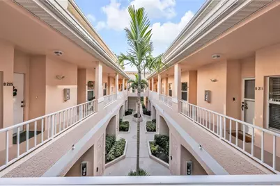 1044 Woodshire Lane #B211, Naples, FL 34105 - Photo 2
