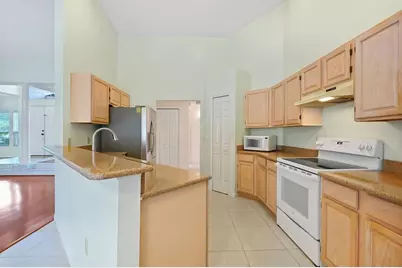 9655 Lake Douglas Place, Orlando, FL 32817 - Photo 8