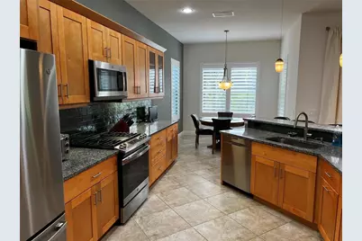 12051 Thornhill Court, Lakewood Ranch, FL 34202 - Photo 16