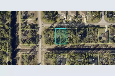 506 Raintree Street E, Lehigh Acres, FL 33974 - Photo 1
