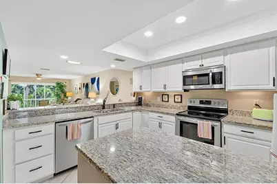 7143 Wood Creek Drive #203, Sarasota, FL 34231 - Photo 8