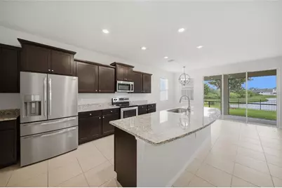 3940 Mossy Limb Court, Palmetto, FL 34221 - Photo 10