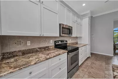 12951 SW Kingsway Circle, Lake Suzy, FL 34269 - Photo 8