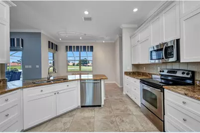 12951 SW Kingsway Circle, Lake Suzy, FL 34269 - Photo 4