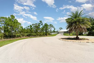 9437 Treasure Lake Court, Saint James City, FL 33956 - Photo 4