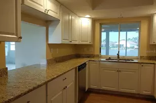 11826 SW Dallas Dr S, Lake Suzy, FL 34269 - Photo 4