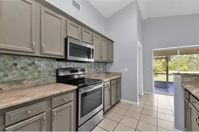 13440 SW Pembroke Circle N, Lake Suzy, FL 34269 - Photo 16