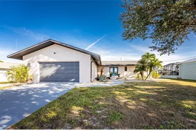 128 Sinclair Street SE, Port Charlotte, FL 33952 - Photo 1