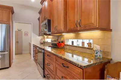 8899 Eagle Bay Court, North Port, FL 34287 - Photo 12