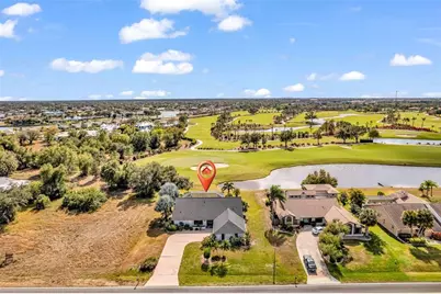 11903 SW Kingsway Circle, Lake Suzy, FL 34269 - Photo 1