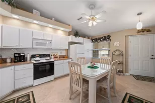 11644 SW Egret Cir, Lake Suzy, FL 34269 - Photo 8