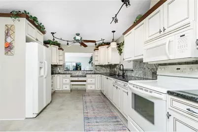 11409 SW Courtney Drive, Lake Suzy, FL 34269 - Photo 8