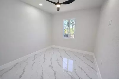 2421 Milton Avenue S, Lehigh Acres, FL 33973 - Photo 28