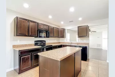 13221 Waterford Castle Drive, Dade City, FL 33525 - Photo 22