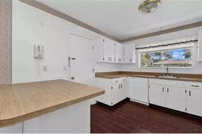 1361 Frizzell Lane NW, Port Charlotte, FL 33948 - Photo 18