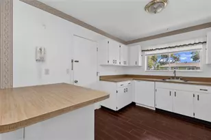 1361 Frizzell Ln NW, Port Charlotte, FL 33948 - Photo 18