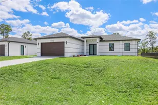 1122 S Edelweiss Street E, Lehigh Acres, FL 33974 - Photo 2