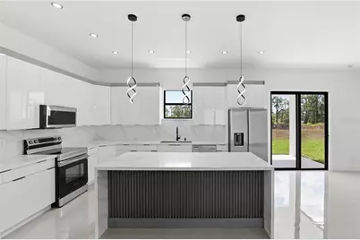 1122 S Edelweiss Street E, Lehigh Acres, FL 33974 - Photo 8