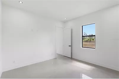 1122 S Edelweiss Street E, Lehigh Acres, FL 33974 - Photo 18